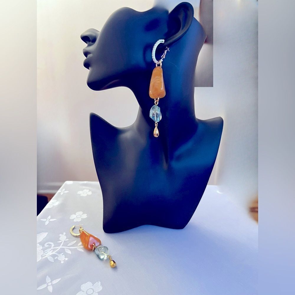 Dangle earrings with 3” drop from ear.